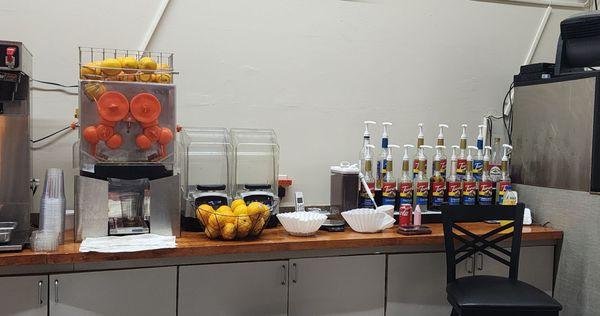 Machine to make fresh squeezed orange juice.