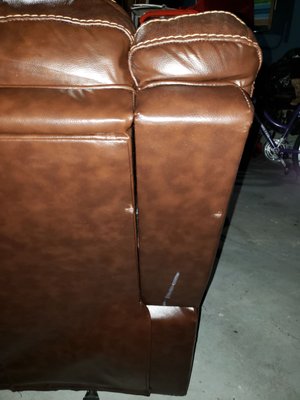 More leather sofa damage. Again 60¢ per pound damage "coverage". DO NOT USE Medal of Honor Moving Group nor DG Moving!