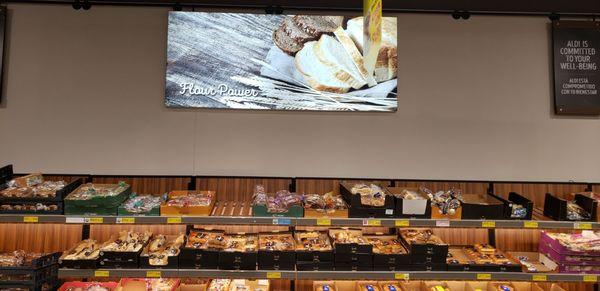 The bread section on the right wall when you walk into the store.