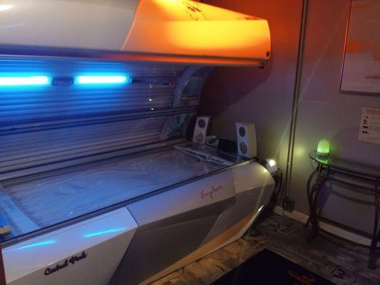 Tanning bed with sensors to adjust tan level.