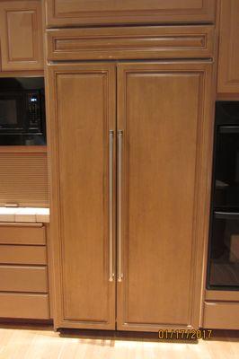 New refrigerator with new wood panel by Cabinetworks