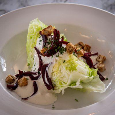 WEDGE SALAD
Crisp iceberg, house-made Roquefort dressing, red wine onions, tiny-cut croutons & fresh herbs