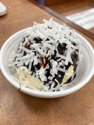 Coconut flakes and hot fudge