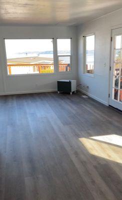 New floors: vinyl planks- so easy to care for, soft and not too cold on feet and look beautiful