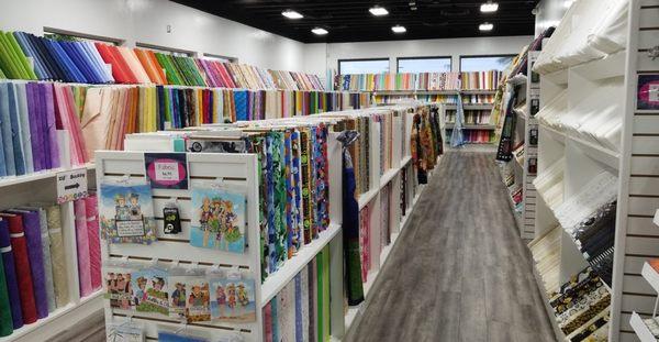 Fabric displays in Mulqueen Sewing & Fabric Tempe location.