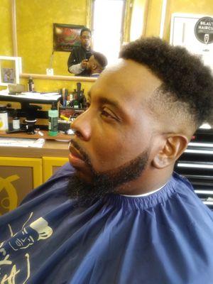 Bald fade high top tight beard trim