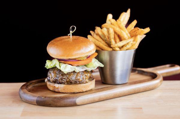 The Whole 9 Yards Burger - 1/2lb Brandt beef patty stuffed with Central Coast Creamery cheddar, pickles, lettuce, tomato, onion, black garli