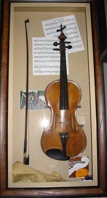 Violins are great for framing! Almost any item can be elevated with a little imagination!