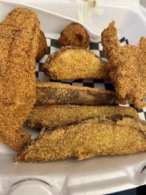 Breaded fish and potato wedges