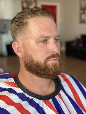 Slick back scissor cut with a beard trim and lining