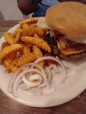 Cheeseburger with fries that come with it. Lettuce & Tomato came on the side but were already put inside burger before photo was taken.