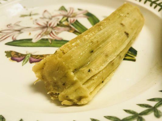 Spicy pork tamales in green sauce are Bomb! Get'em :)...