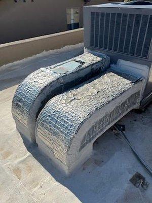 New rooftop duct installation with a high-efficiency A/C unit in Albuquerque.