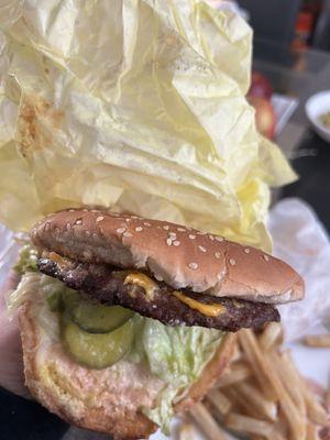 This is the so called hamburger I ordered but looks like a CHEESEburger with pickles