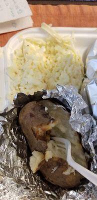 Baked potato and cole slaw come with the broiled fish.