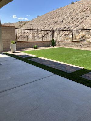 Complete back yard, pavers, turf grass and rock