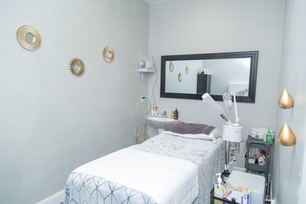 Esthetics room offering spray tan, lash extensions, waxing and more