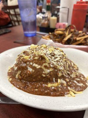 Sausage chili cheeseburger with Spanish fries.