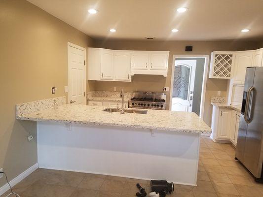 White lacquer finish kitchen cabinets