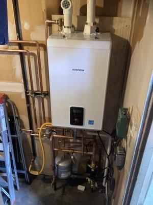 Installed system.  Takes waaay less space then the old boiler and water heater.