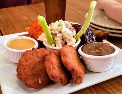 Kaya's Combo- vegan nuggets, tempeh buffalo wings, seitan ribs, potato salad. Yummy!