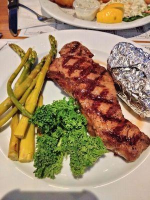 Steak, baked potato, asparagus