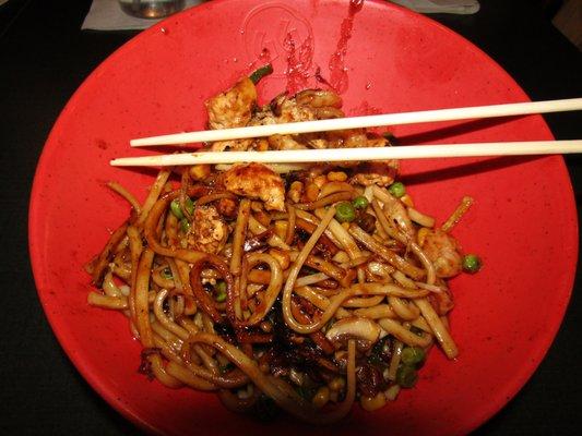 Eating with chop sticks adds to the experience