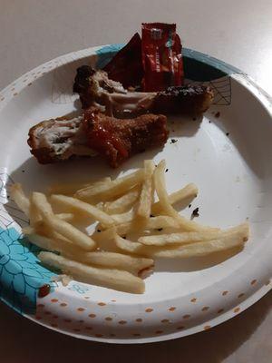 My plate of rotisserie chicken (very dark and peppery) and fries.