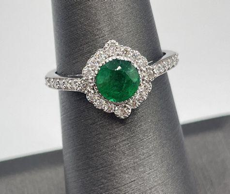 Emerald and diamond ring in 14 karat gold