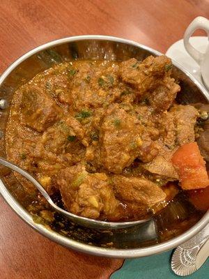 Lamb Curry -- A traditional lamb dish cooked with onion gravy & spices