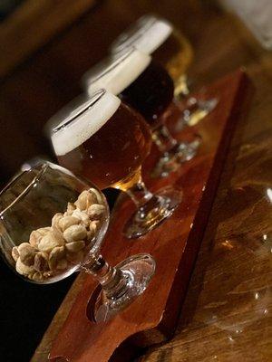 Beer flight with peanuts