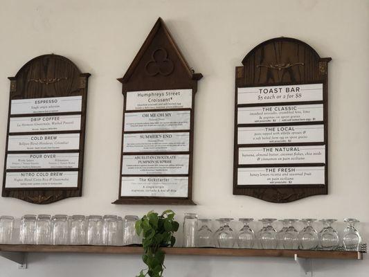 Menus posted on the wall.  Paper copies of the menu are have more items listed.