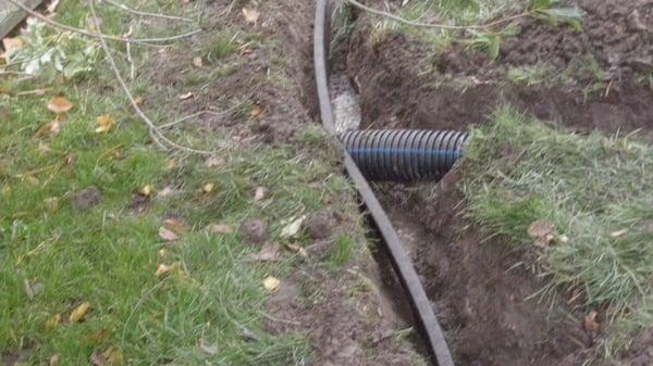 Strip drain systems (a different approach in resolving  excessive water from your yard)