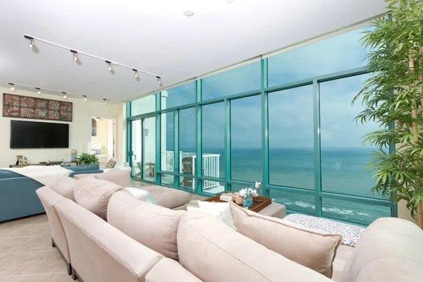 3 bedroom penthouse in the sky located directly on the beach at the Sapphire Resort.