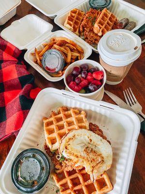 Chicken and waffles x2, one with extra sausage and fries, one with a fruit cup and an egg. + vanilla lavender chai latte b