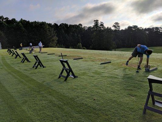 Driving range. Early morning.