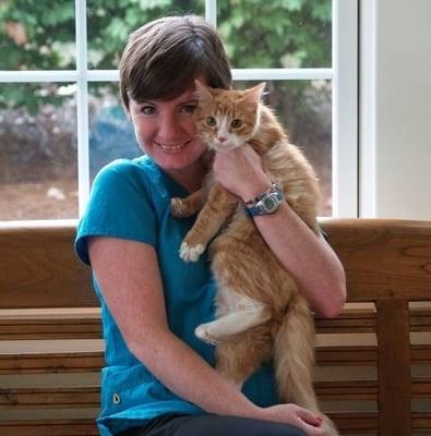 Lindsey, a vet assistant, with her cat Legolas.