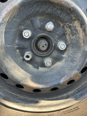 Wrong lug nut and also broken wheel stud.