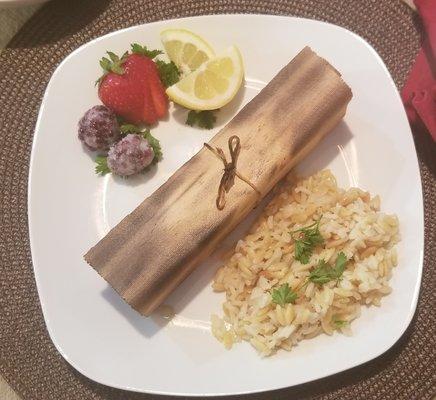 Grilled Cedar wrapped salmon with homemade rice pilaf.