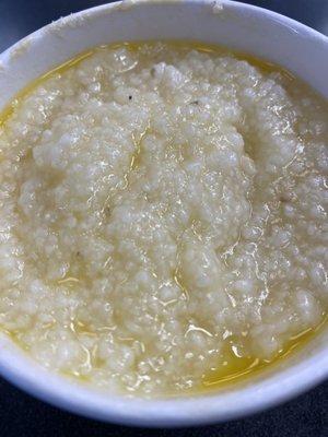 Grits with butter, sugar, and a pinch of salt, like a proper Southerner.