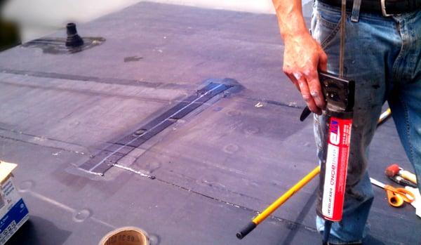 Flat roof leak repair.