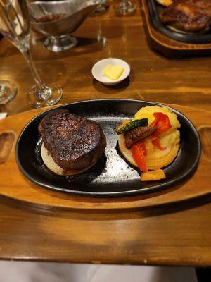 Course 4: filet mignon with mashed potato (served on top of delicious onions to prevent burning from the sizzling plate)