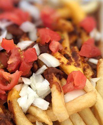 Chili Cheese Fries, we added the tomatoes and onion at home