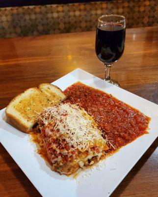 Needed some comfort food today. The lasagna with meat sauce and garlic bread, with a nice merlot, fits the bill.