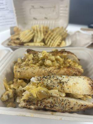 Chicken Cheesesteak with Onions, waffle fries.