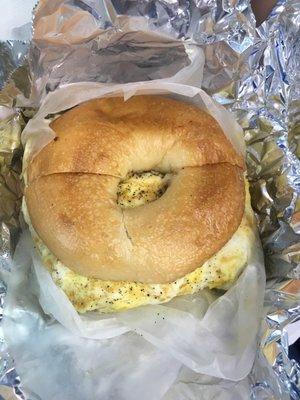 Hot sausage, egg, and cheese bagel sandwich