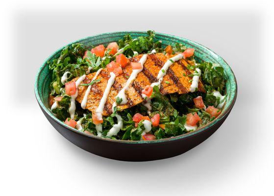 Salmon Power Bowl- grilled Atlantic salmon, shredded kale, beans, tomato, quinoa-edamame mix, tossed in seasoned olive oil.