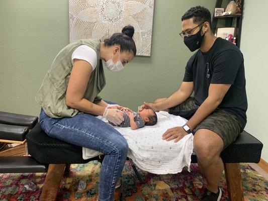 Our 3 day old baby boy getting adjustments with JJ. He is such a nurses so much better now.