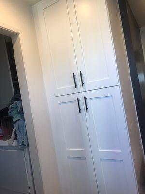 Pantry with black matte pulls. Cupboards and drawers all self closing