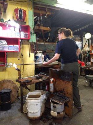 Working a tumbler over the blow torch flame